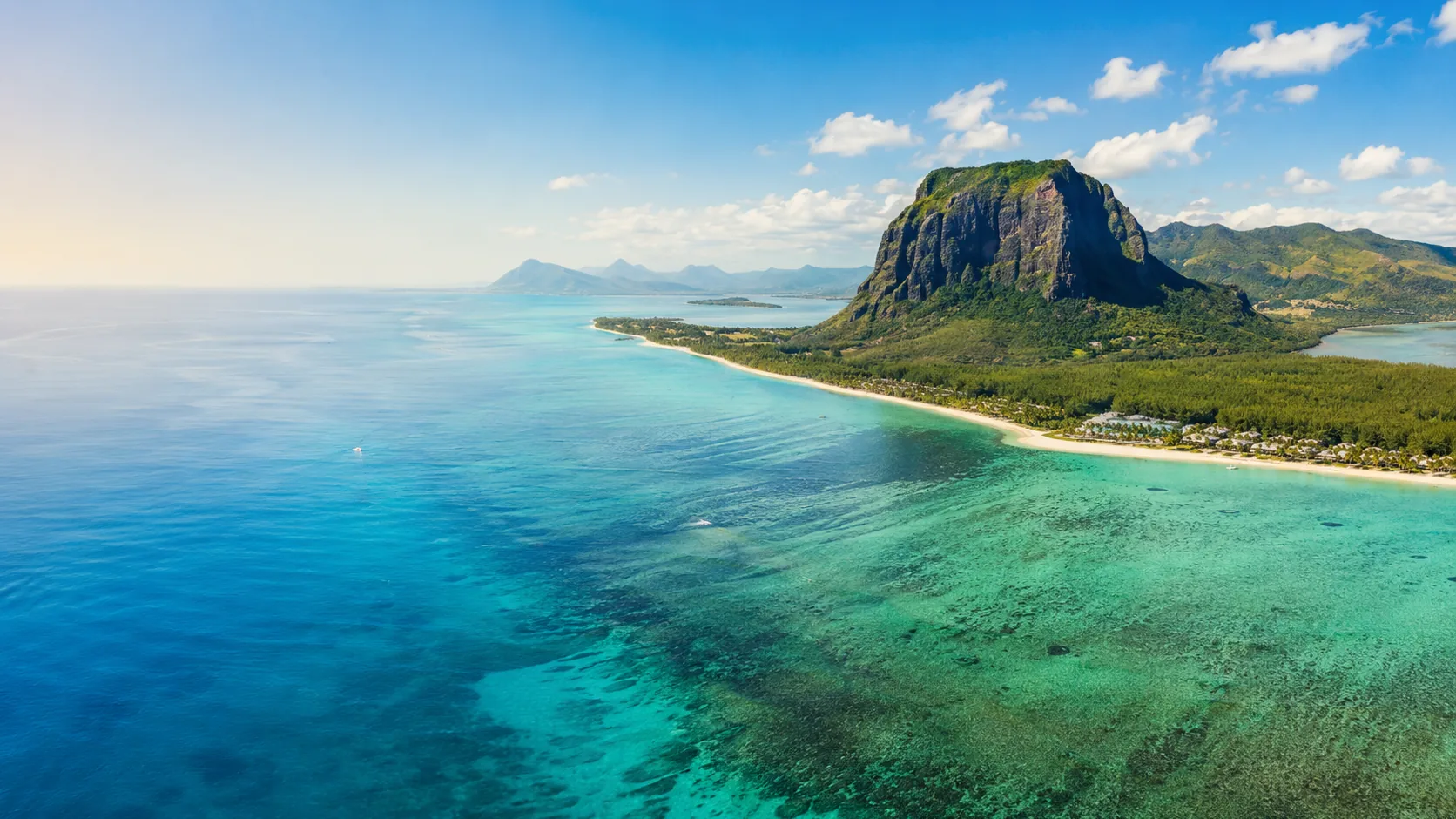 Aerial view of Le Morne Brabant and the turquoise lagoon, Mauritius